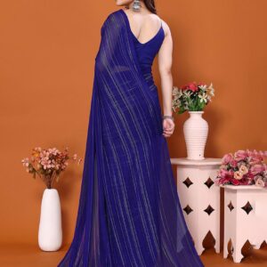 Model wearing a navy blue striped casual wear satin saree with a matching blouse.