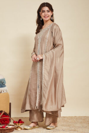 Model wearing a luxurious grey embroidered silk Anarkali kurta featuring a round neck and full sleeves, paired with a matching dupatta for weddings and festive occasions.