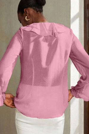 Close up of tie front and ruffle bell sleeves on pink top by Sona Mart