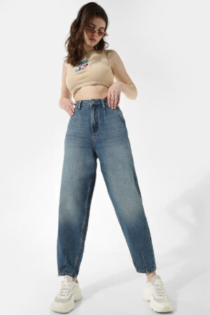 Woman wearing Sona Mart premium blue high rise slouchy fit 100 percent cotton jeans