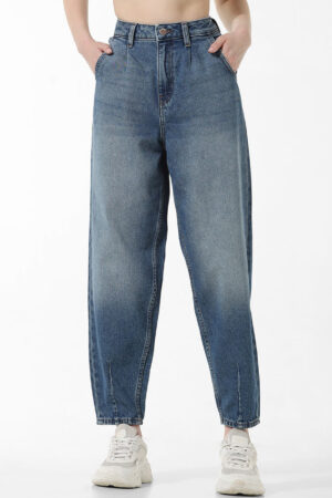 Close up of button and zip closure on Sona Mart blue high waist relaxed fit women's denim