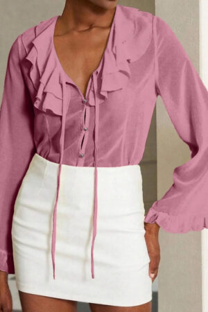 Woman wearing Sona Mart dusty pink ruffle trim semi sheer bell sleeve top