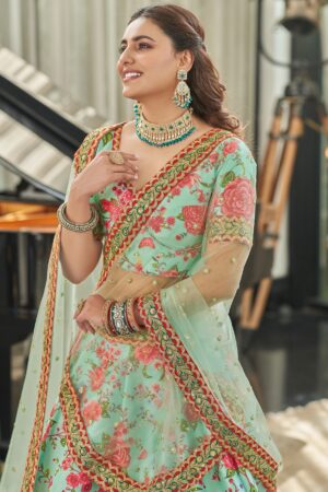 Close up of sequins dori and stone work on green silk lehenga by Sona Mart