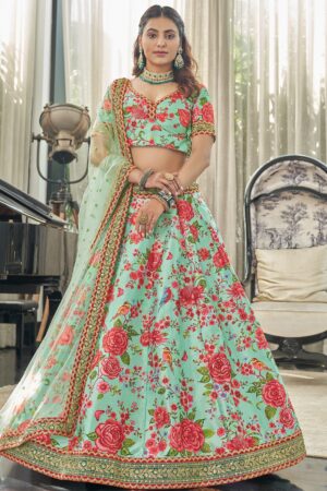 Woman wearing Sona Mart premium mint green floral printed silk plus size lehenga choli