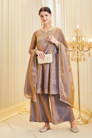 Close up of sweetheart neckline and intricate embroidery on purple silk ethnic wear.