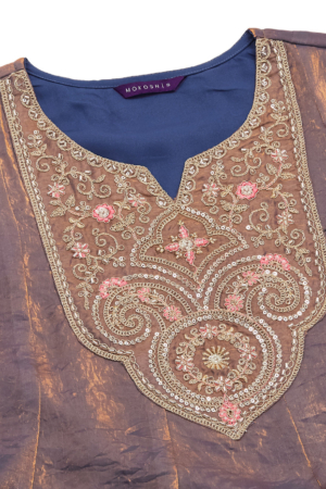 Full length view of flowy ankle length Anarkali suit with full sleeves.