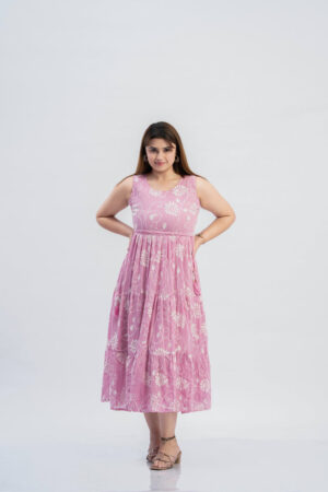 Woman wearing Sona Mart premium pink embroidered tiered midi dress