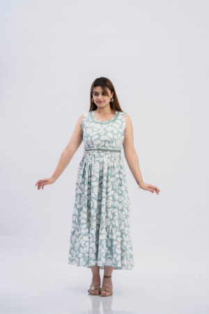 Detail shot of attached inner sleeves and V-neckline on a mint green floral dress