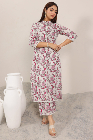Close up of mandarin collar and pink floral print on a cotton kurta