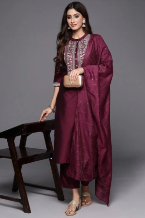 Woman wearing Sona Mart premium wine silk blend straight suit set with dupatta