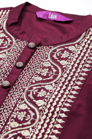 Full length view of burgundy ethnic party wear suit with matching trousers