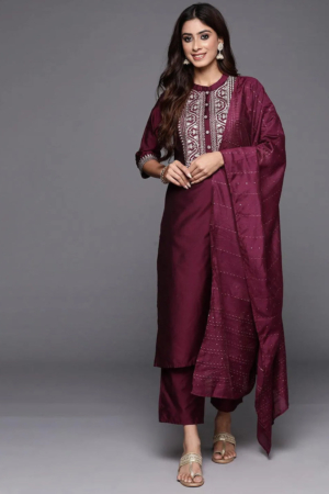 Woman wearing Sona Mart premium wine silk blend straight suit set with dupatta